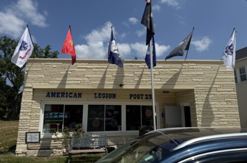 Post 231 Storefront and Flag Line